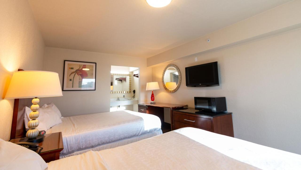 Magnuson Extended Stay And Suites Airport Hotel Irving Exterior foto